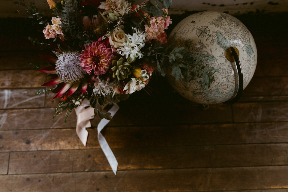 ampersand sf bridal bouquet and vintage globe