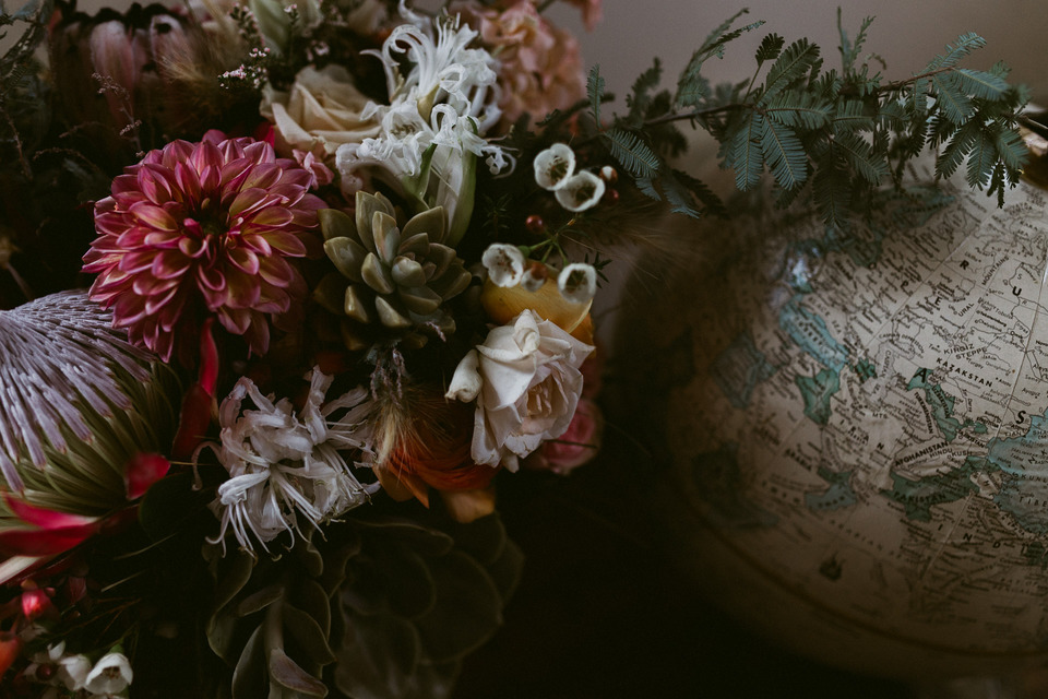 vintage globe and bridal bouquet by ampersanf sf