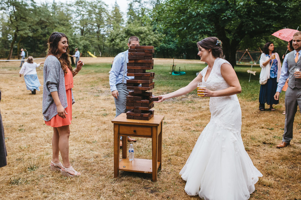 backyard wedding in the oregon forest with lawn games and pie