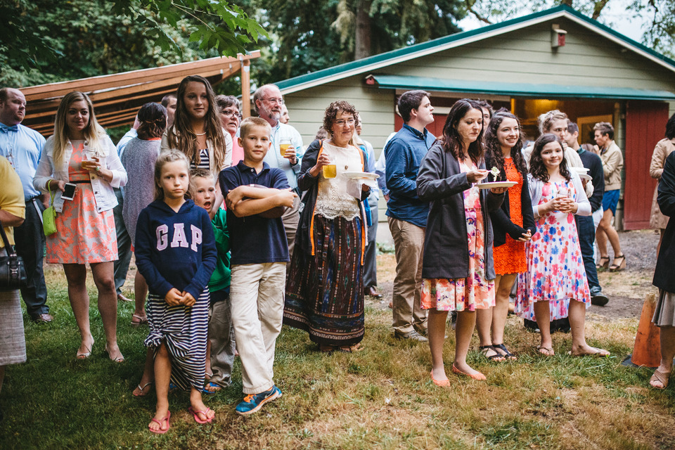 backyard wedding in the oregon forest with lawn games and pie